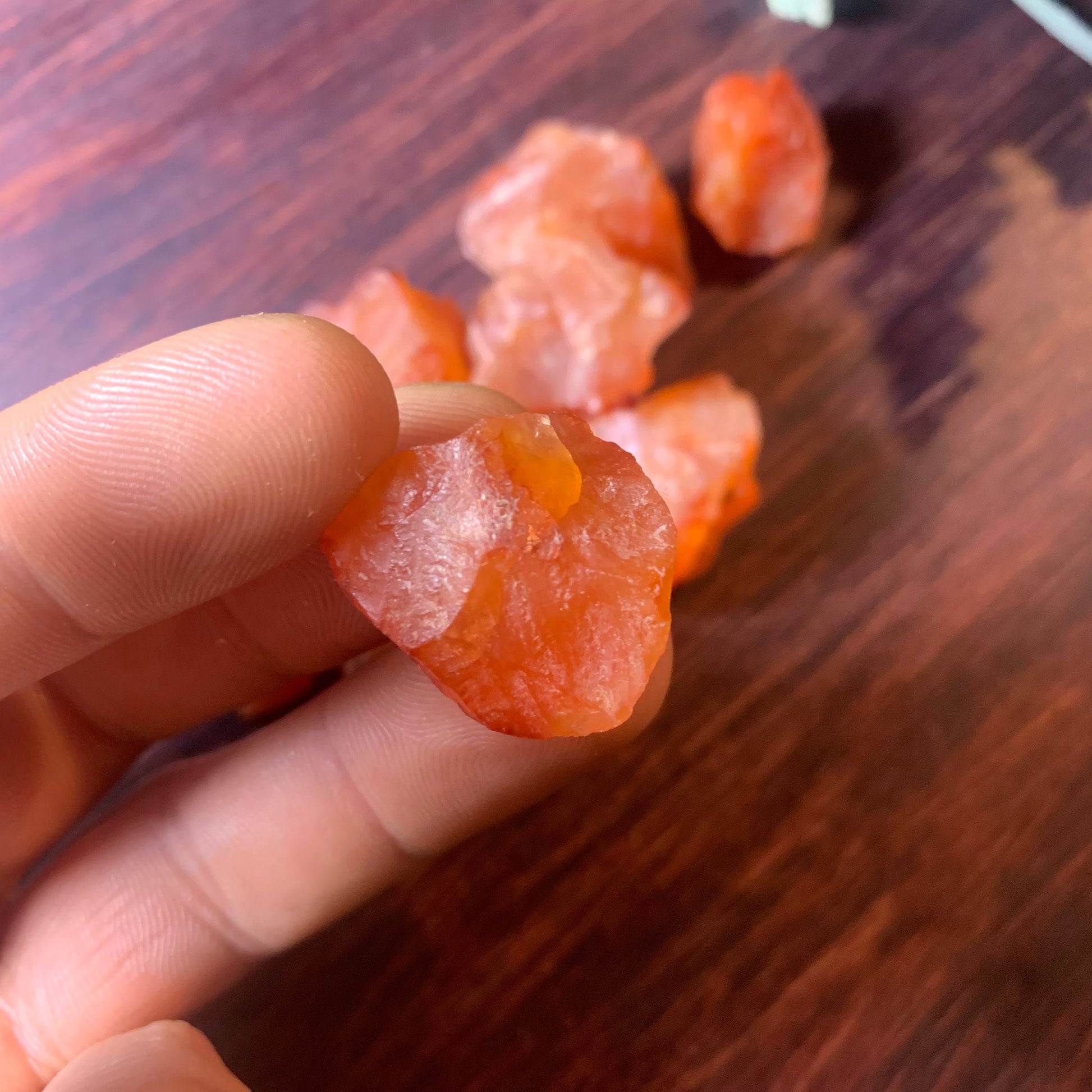 Raw Carnelian hand comparison
